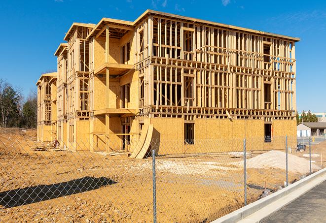 a temporary chain link fence surrounding a construction site, requiring strict safety precautions in Loudonville OH